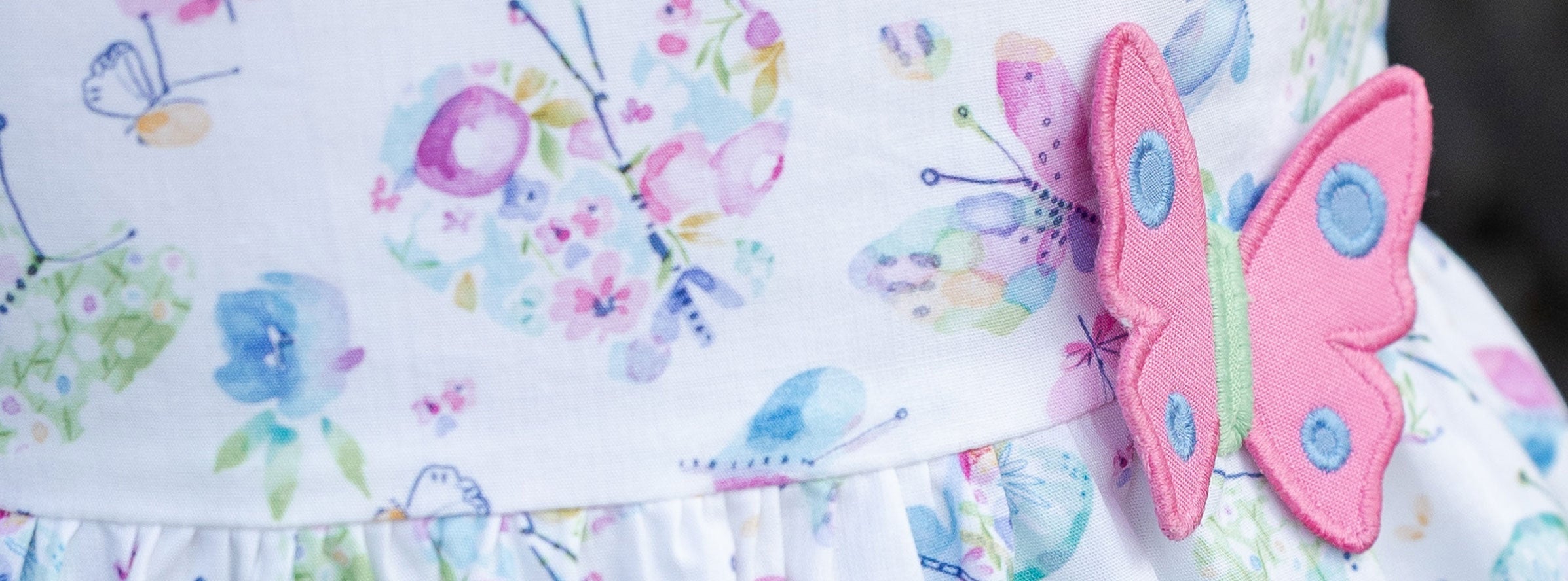 closeup of pink butterfly appliquΓ©