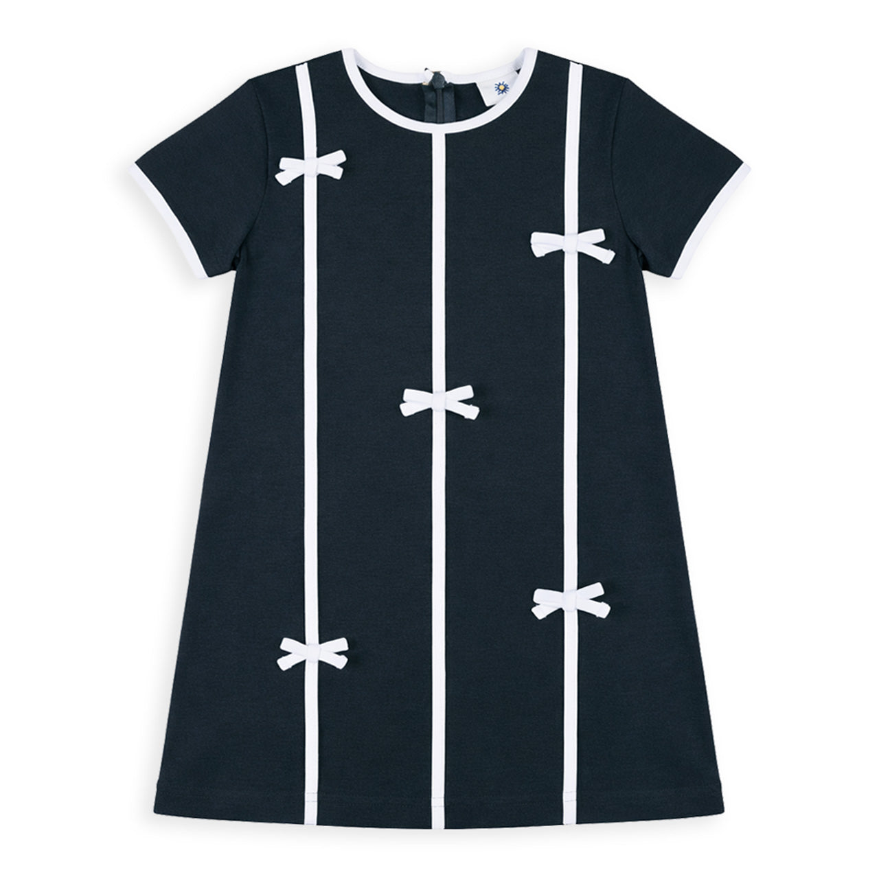 Navy dress with white bow details on a white background