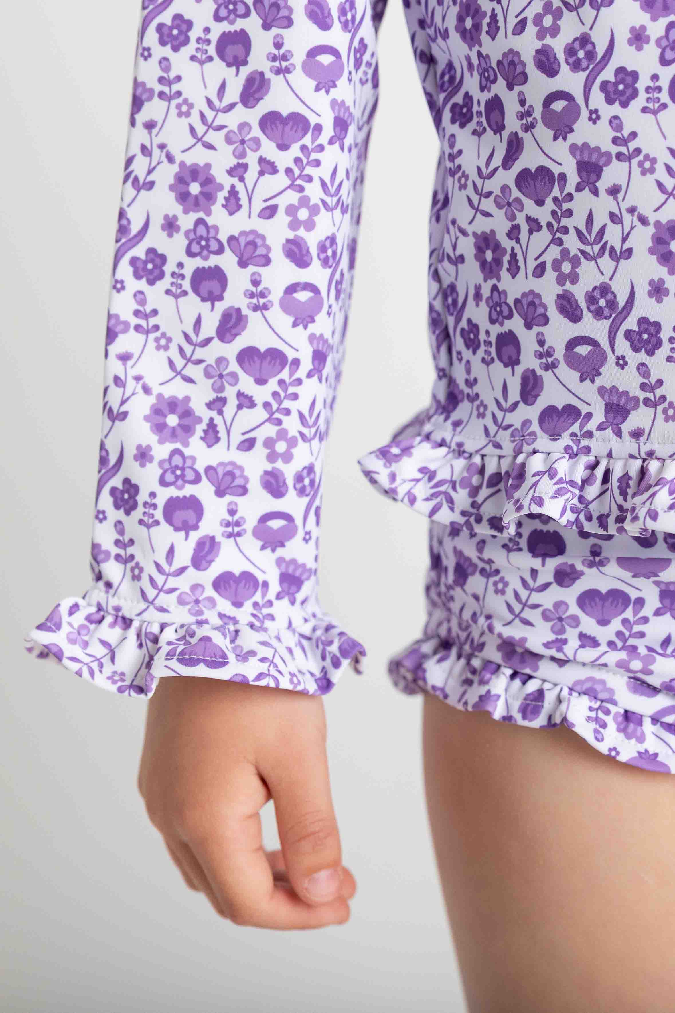 Closeup of purple floral pattern and ruffles