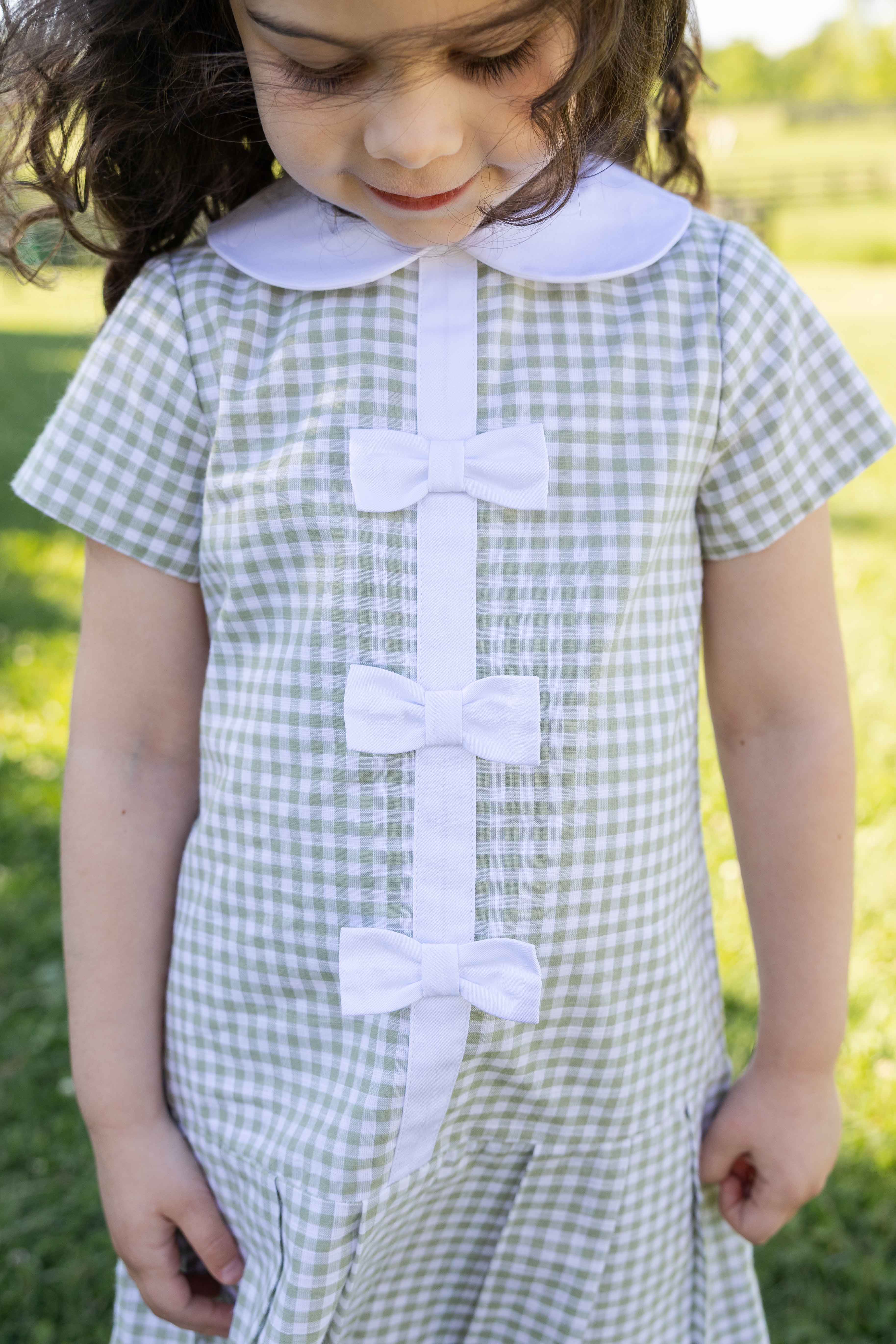 Check Dress with Pleated Skirt And Bows