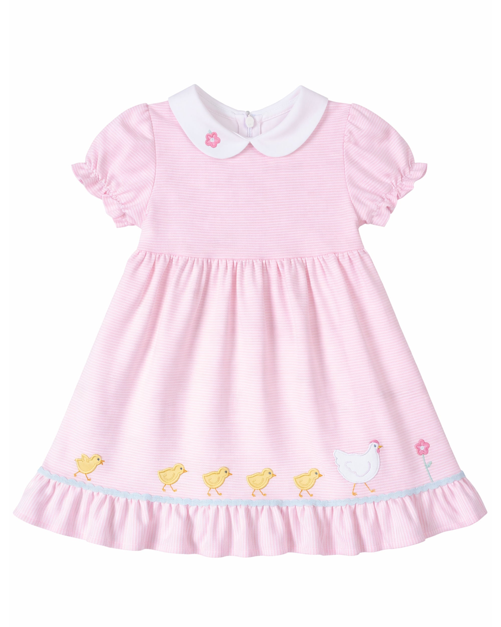 Pink dress with embroidery on a white background