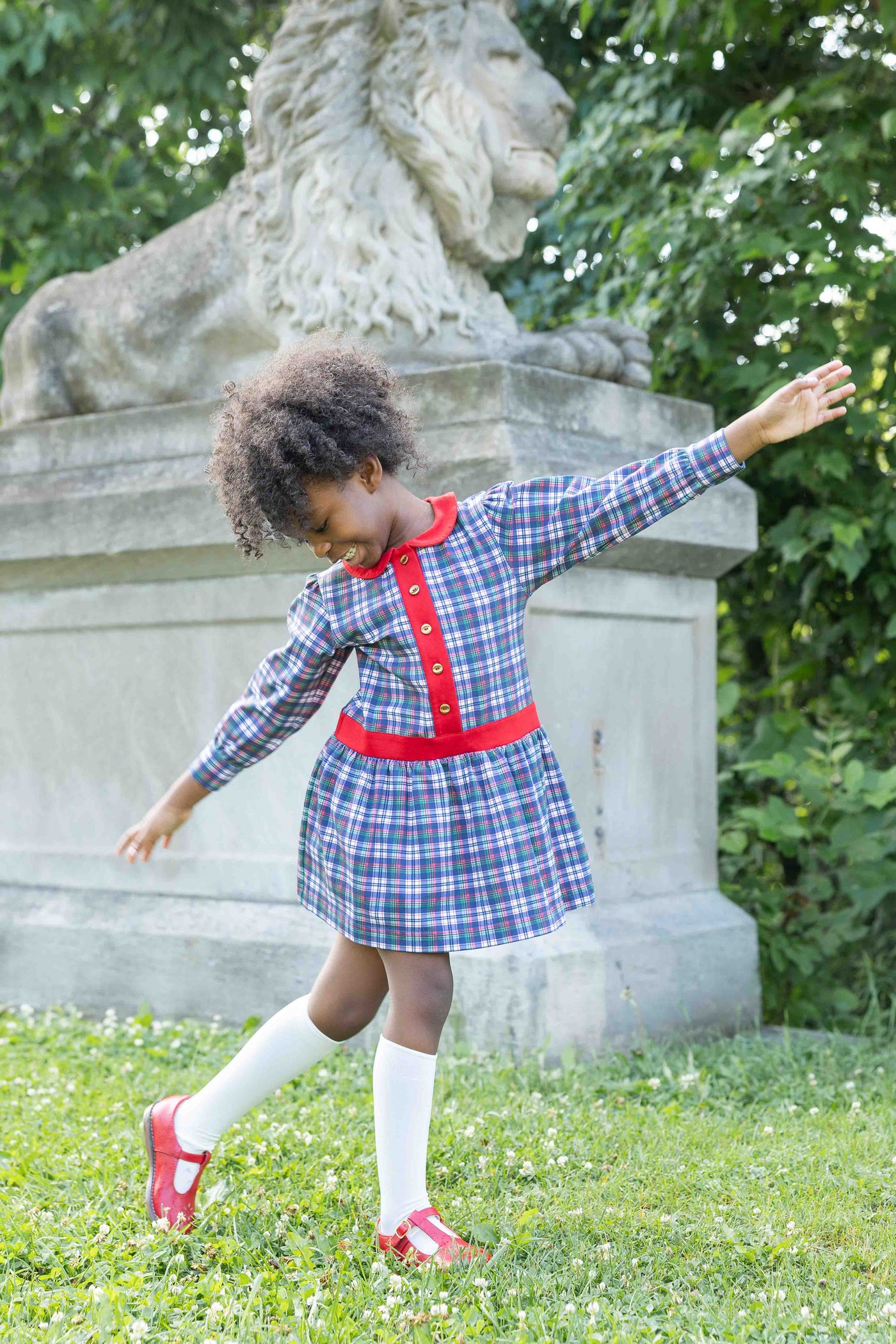 young girl dancing outside