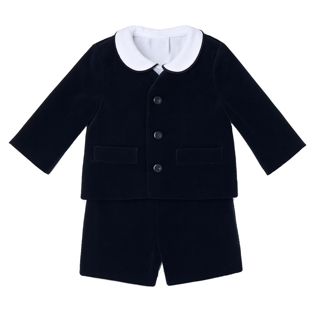 Navy velvet suit with white shirt collar on a white background