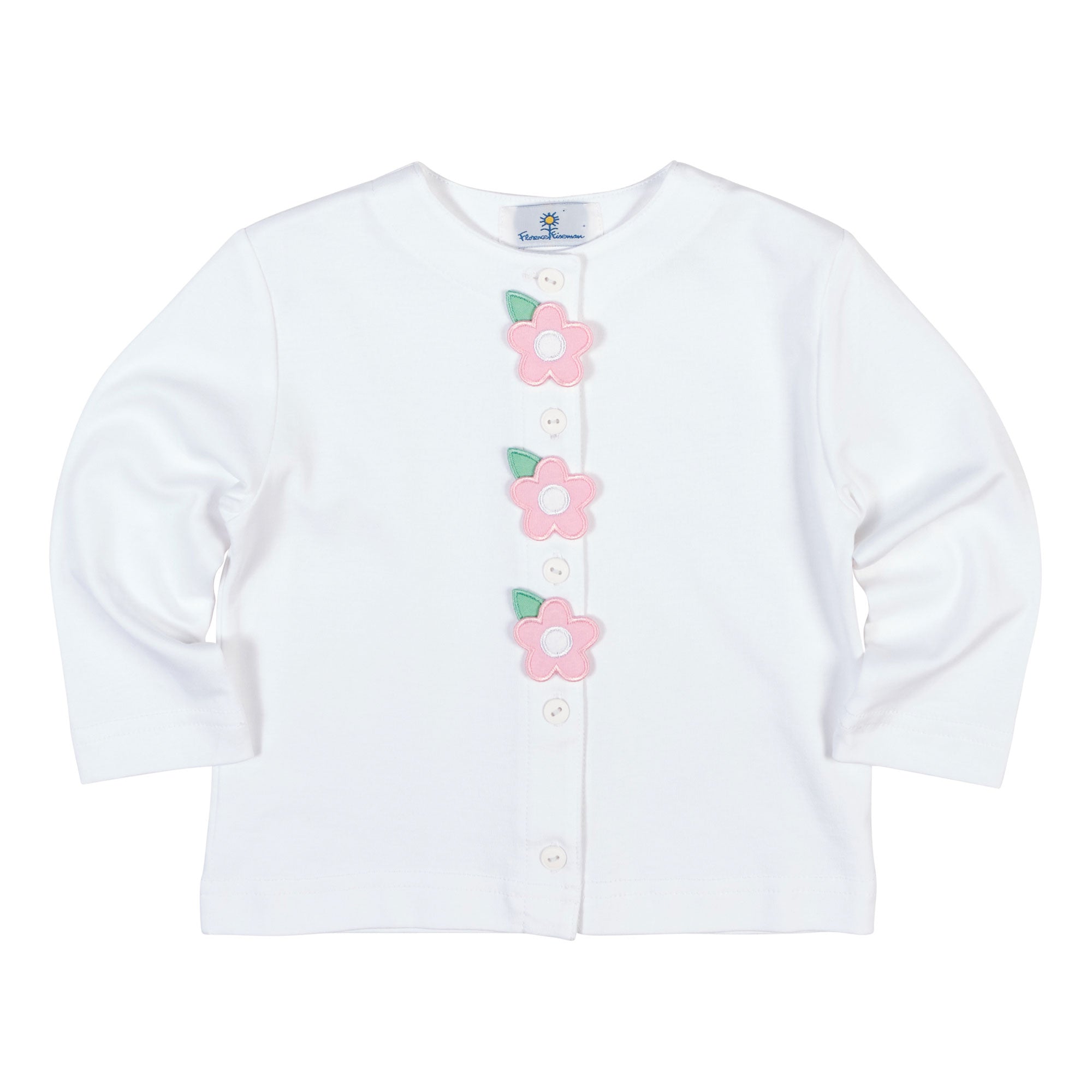 White cardigan with pink floral buttons on a white background