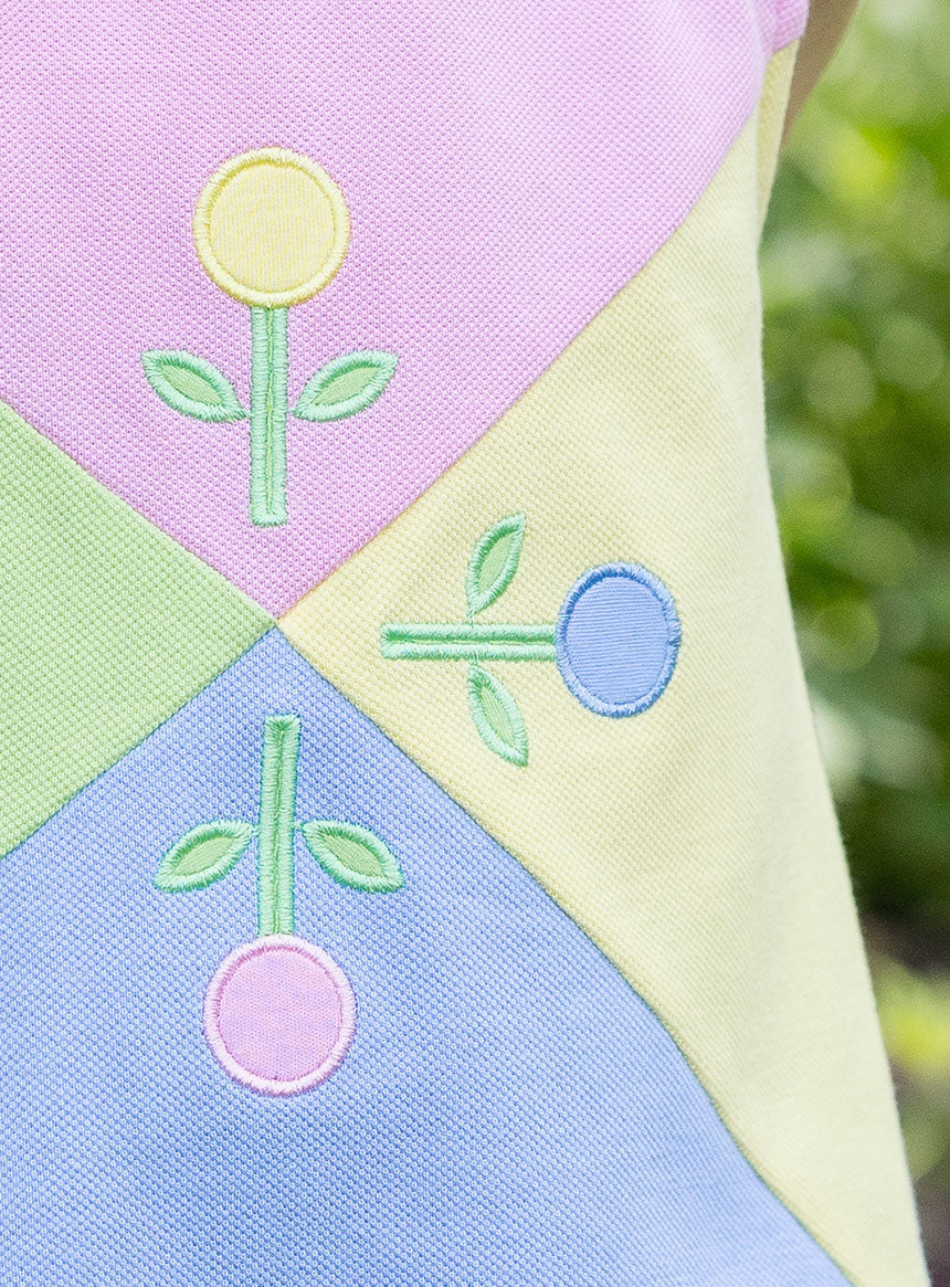 close up of flower appliqués with circle buds