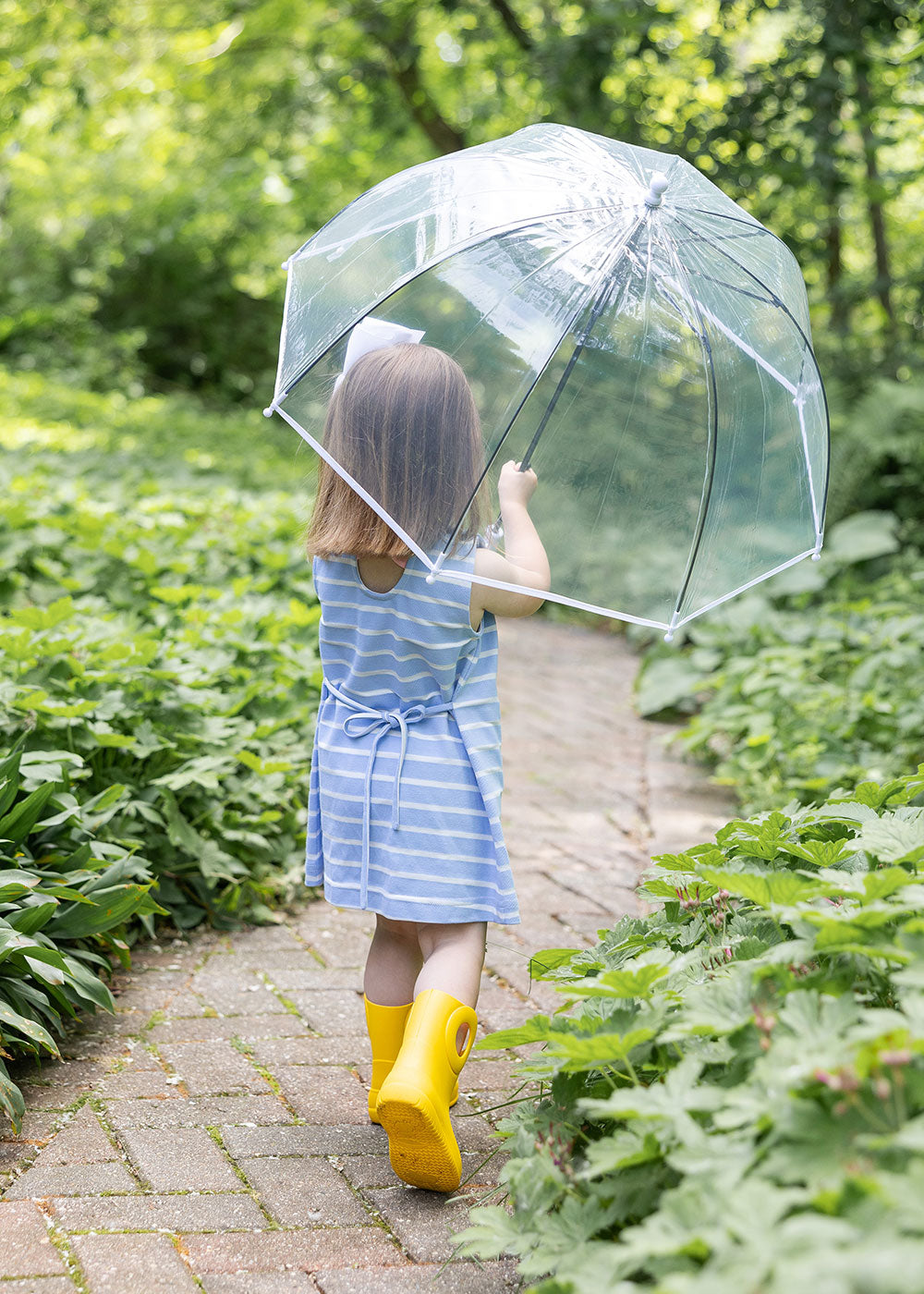 back view of young girl wearing Stripe Knit Dress