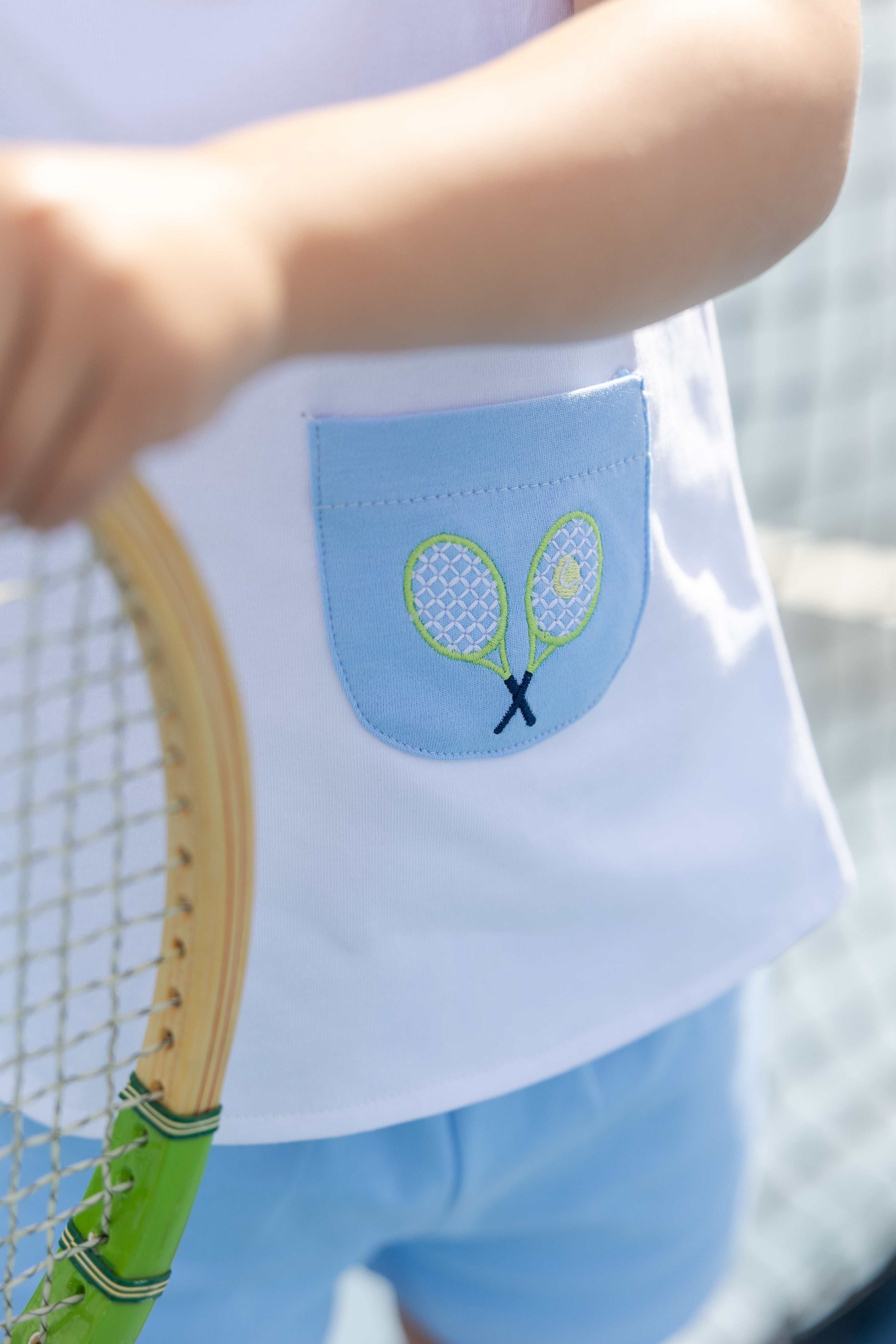 closeup of tennis racket applique pocket