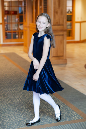 girl in blue velvet dress