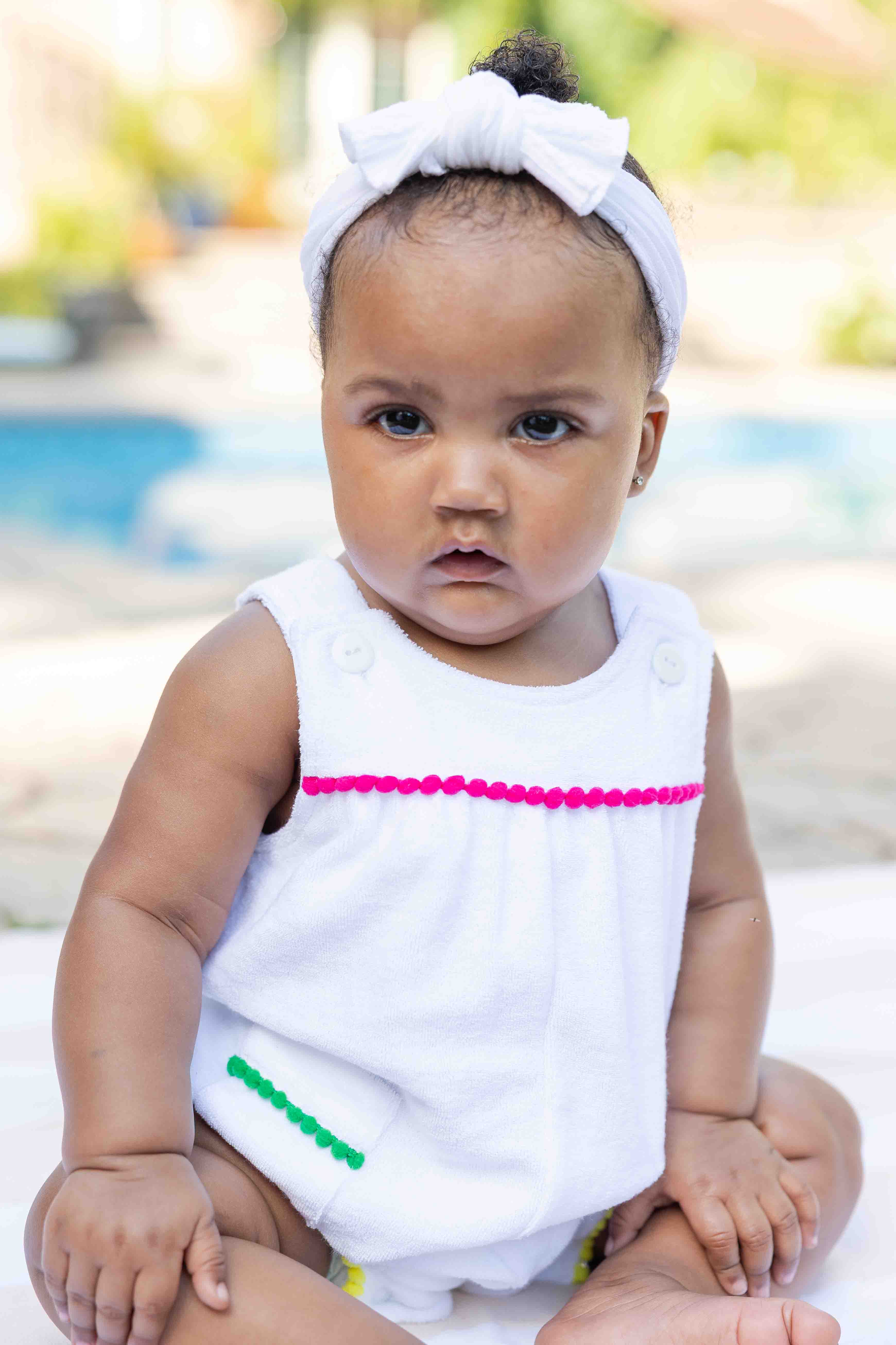 Terry Romper With Pom Poms
