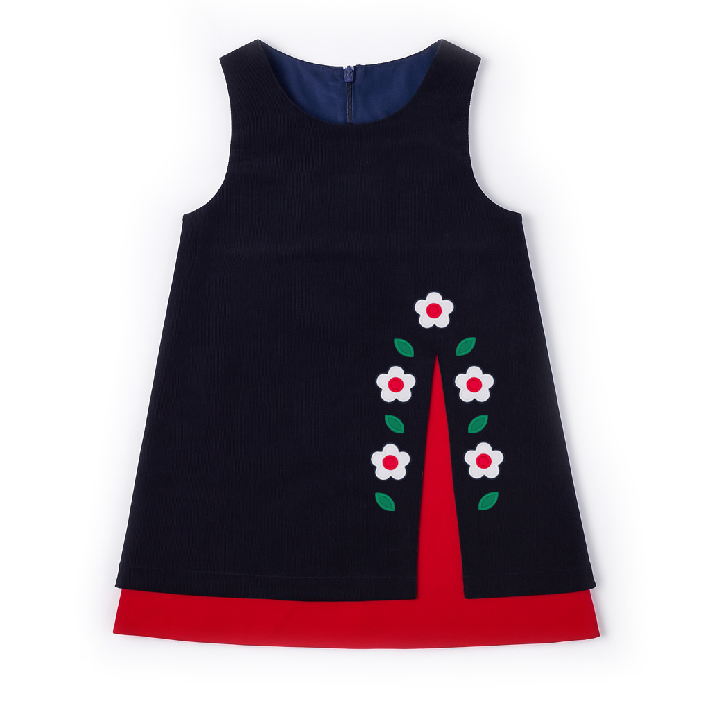 Black dress with red bottom and white floral design on a white background