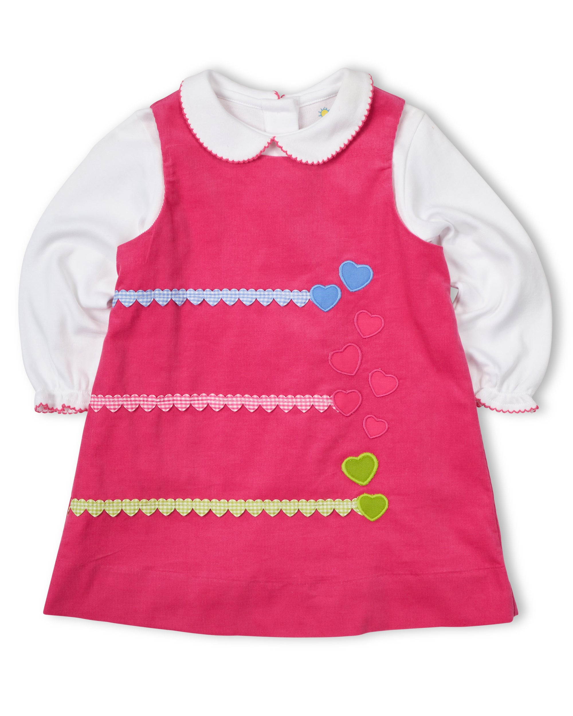 Pink dress with white collar and heart decorations on a white background