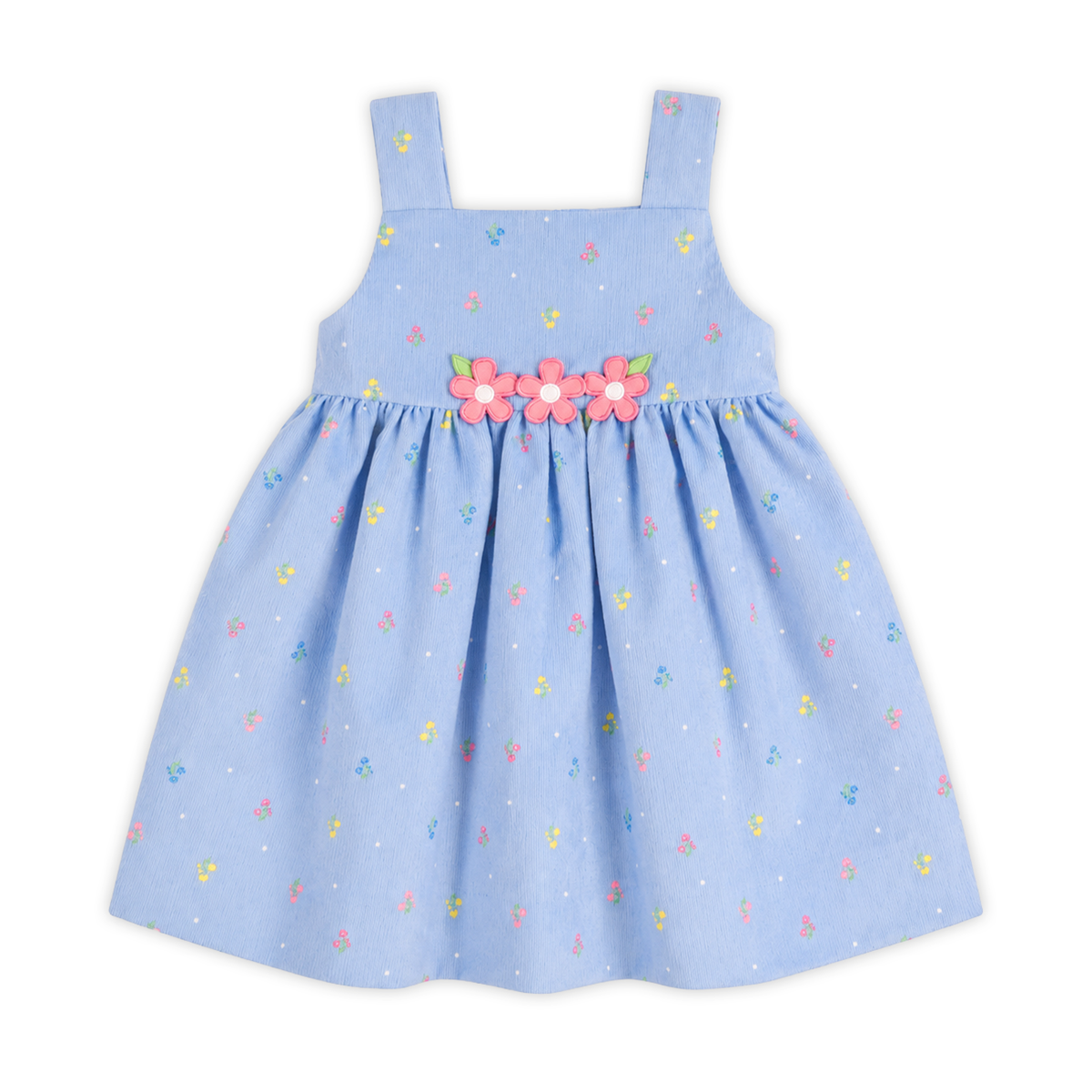 front view of blue corduroy jumper with flower appliqué on a white background