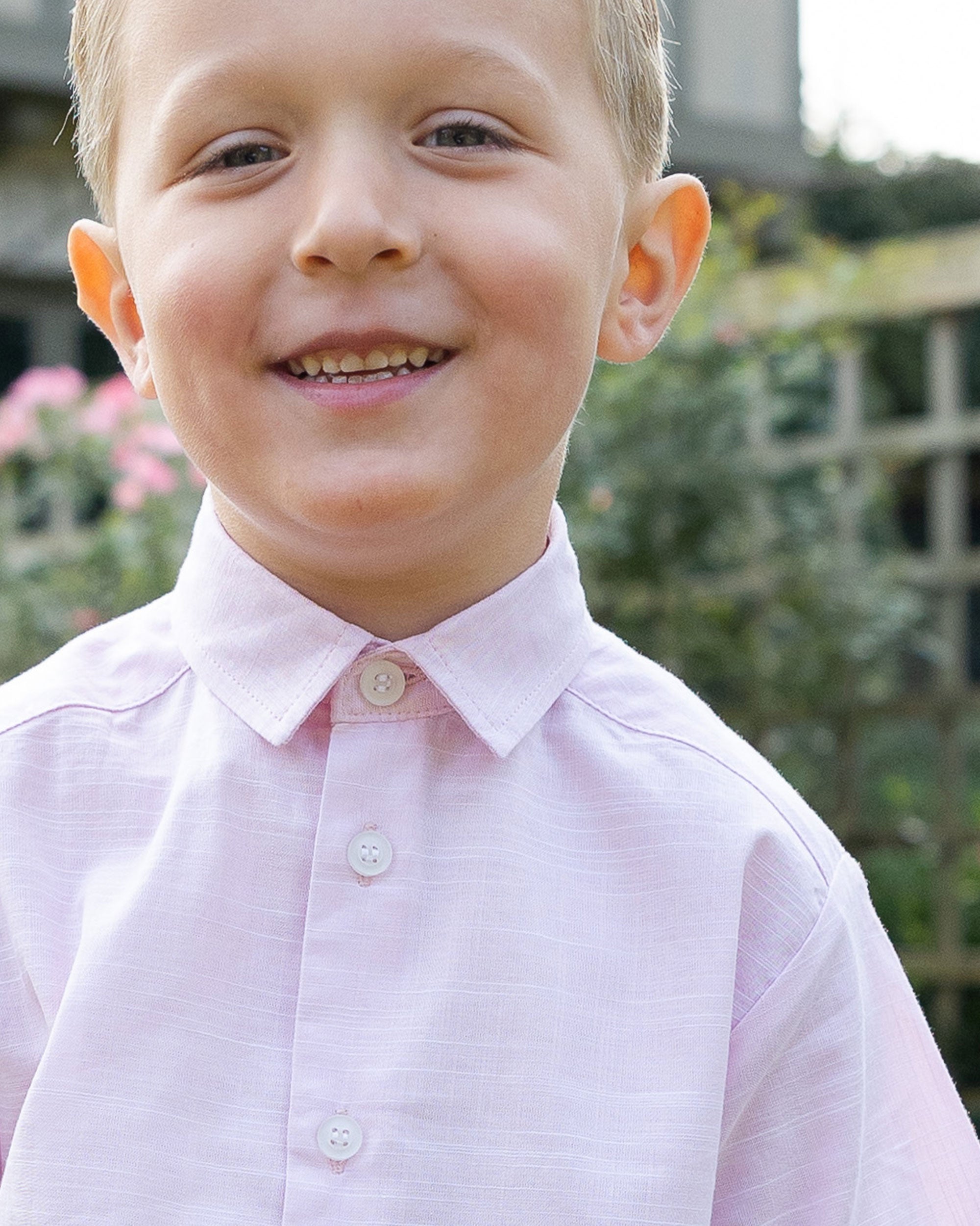 closeup of pink linen look camp shirt