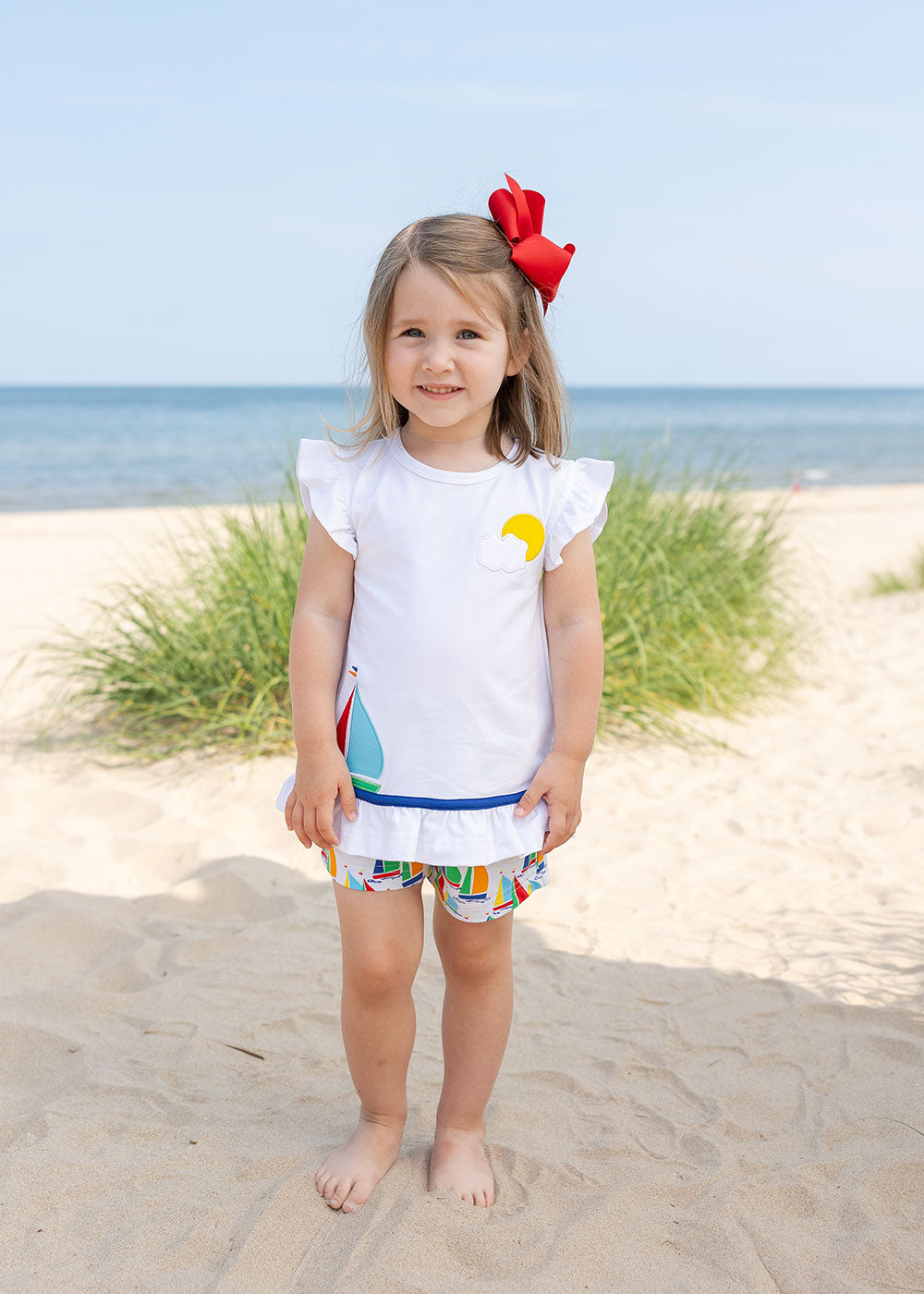 young girl in Sailboat Top with Shorts